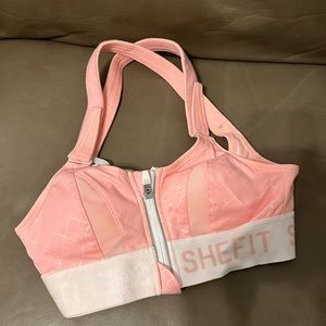 SHEFIT sports bra. XS size. Brand new.